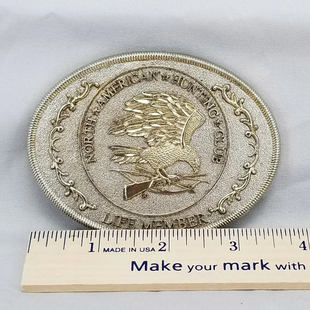 North American Hunting Club Belt Buckle – Eagle with Rifle & Shotgun Life Member